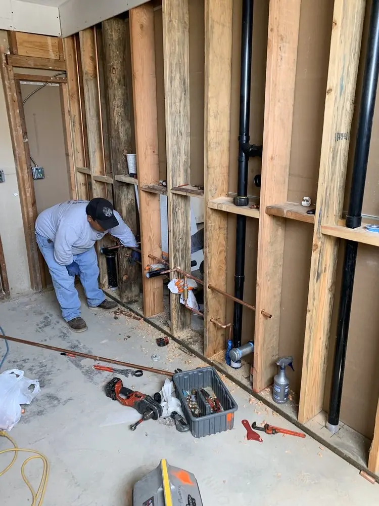 Commercial rough-in plumbing for Water Heater Replacement in Wells Avenue Neighborhood